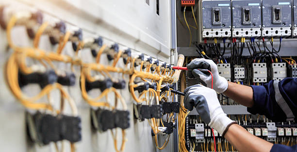 Professional Electrician technician working in Tolono, IL